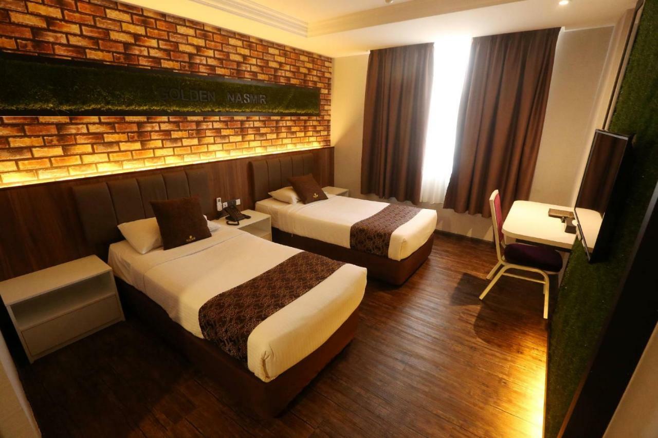 Golden Nasmir Hotel Букит-Мертаджам Экстерьер фото