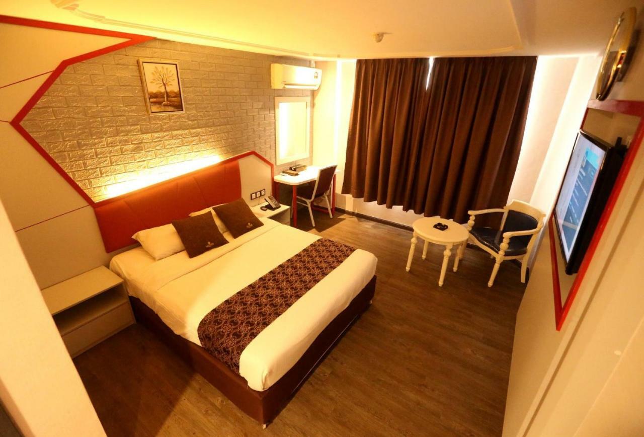 Golden Nasmir Hotel Букит-Мертаджам Экстерьер фото