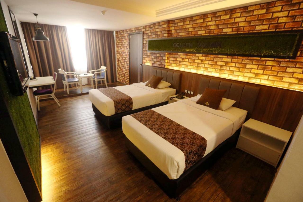 Golden Nasmir Hotel Букит-Мертаджам Экстерьер фото